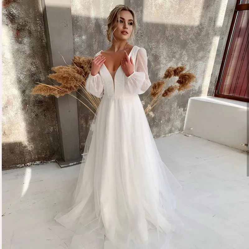 A Line Sexy V Neck Long Sleeves Bridal Gown Custom Made Tulle Beach Wedding Dresses Vestido de Novia
A Line Sexy V Neck Long Sleeves Bridal Gown Custom Made Tulle Beach Wedding Dresses Vestido de Novia