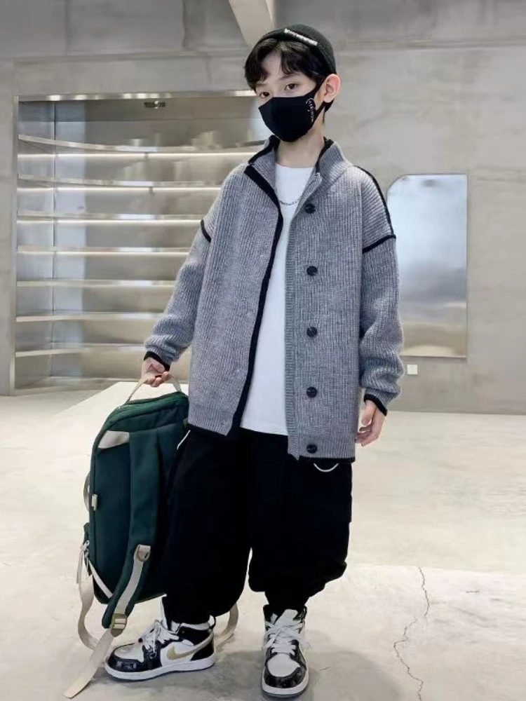 Children's Sweaters, Boys' Outerwear, Autumn and Winter New Middle and Big Boys' Loose Knitted Casual Solid Black Edge Cardigan
Children's Sweaters, Boys' Outerwear, Autumn and Winter New Middle and Big Boys' Loose Knitted Casual Solid Black Edge Cardigan