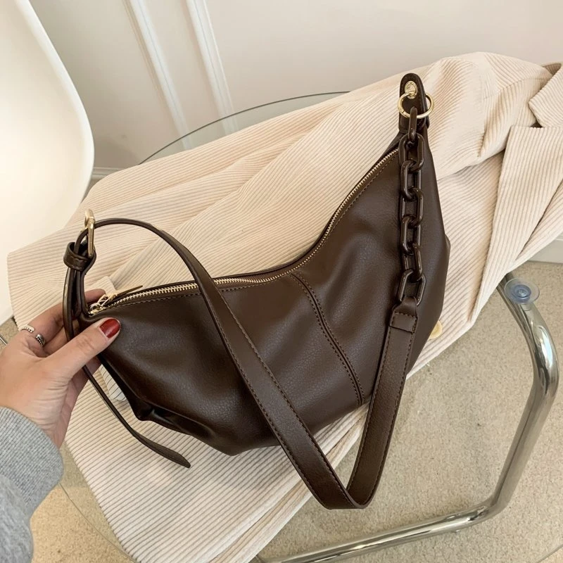 Soft women's leather handbag, high-quality retro binding belt, with solid chain, new 2021 series
Soft women's leather handbag, high-quality retro binding belt, with solid chain, new 2021 series