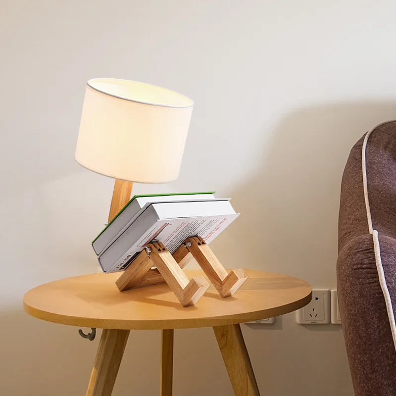 Creative Robot Shape Table Lamp LED Flexible Adjustable Folding Reading Light Wooden Fabric Bedside Lamp Luminaria
Creative Robot Shape Table Lamp LED Flexible Adjustable Folding Reading Light Wooden Fabric Bedside Lamp Luminaria