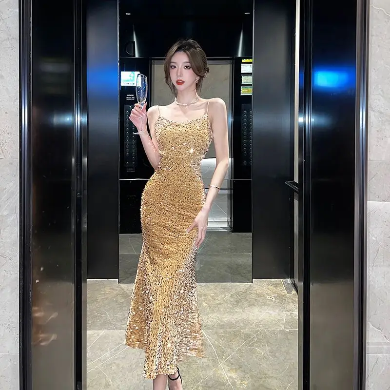Golden Sexy Sequin Sling Dress Shiny Evening Dress Light Luxury Minority High-End Party Photo
Golden Sexy Sequin Sling Dress Shiny Evening Dress Light Luxury Minority High-End Party Photo