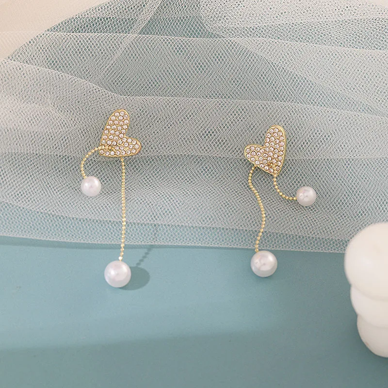 S925 silver needle Korean new style tassel pearl pair of earrings 2022 women's fashion diamond heart-shaped party jewelry gift
S925 silver needle Korean new style tassel pearl pair of earrings 2022 women's fashion diamond heart-shaped party jewelry gift
