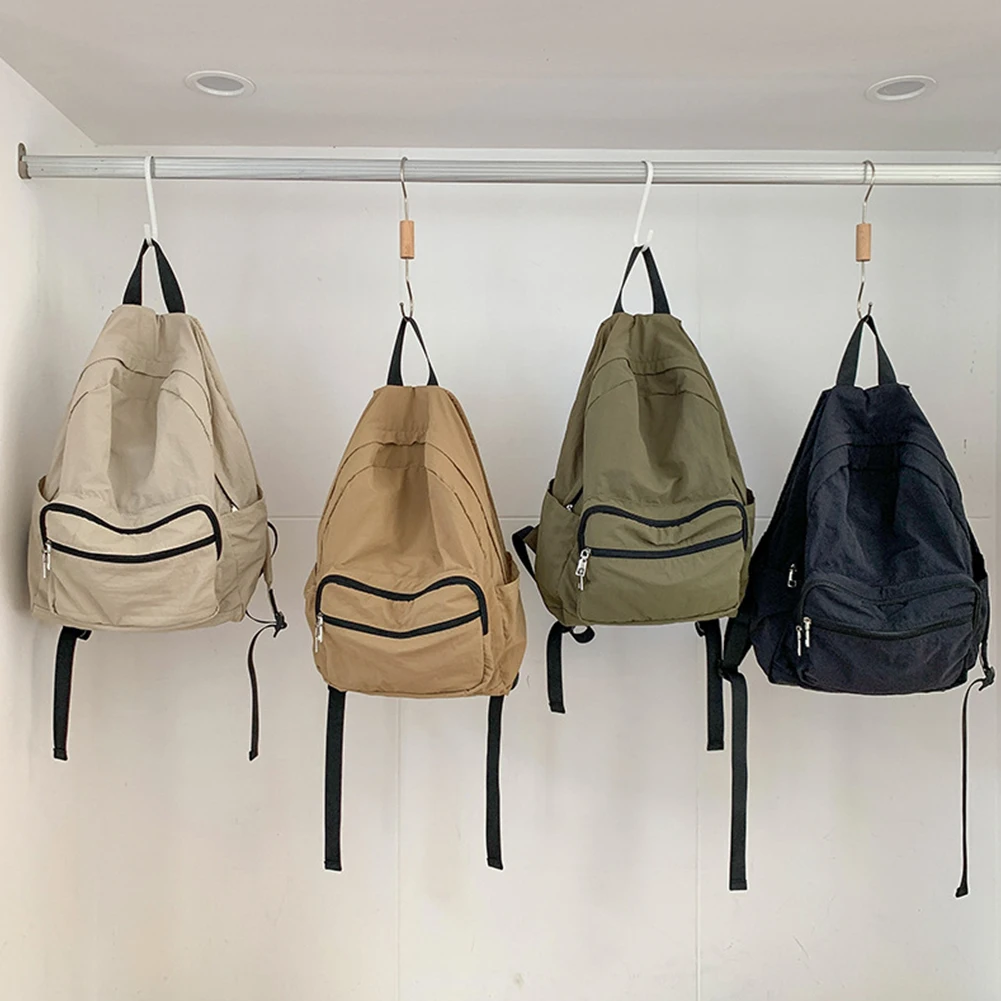 Universal Schoolbag Comfortable Nylon Fashionable Backpack Large Capacity Casual Daypack Zipper Closure Solid School Bag
Universal Schoolbag Comfortable Nylon Fashionable Backpack Large Capacity Casual Daypack Zipper Closure Solid School Bag