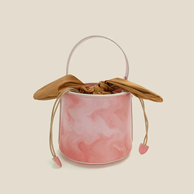 2022 Blooming Popular Fashion Handbag Rabbit Ears Small Round Bag Retro Easy Matching Shoulder Portable Bucket Bag for Women
2022 Blooming Popular Fashion Handbag Rabbit Ears Small Round Bag Retro Easy Matching Shoulder Portable Bucket Bag for Women
