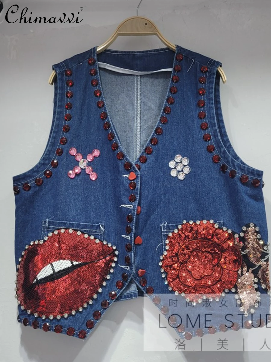 Женский джинсовый жилет с вышивкой, элегантная уличная одежда в европейском стиле с блестками и цветочным принтом губ, кардиган на лето и ос...
Женский джинсовый жилет с вышивкой, элегантная уличная одежда в европейском стиле с блестками и цветочным принтом губ, кардиган на лето и ос...