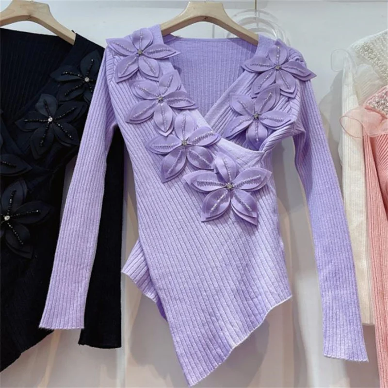 Beaded three-dimensional flower V-neck cross wool sweater fashion slim top women
Beaded three-dimensional flower V-neck cross wool sweater fashion slim top women