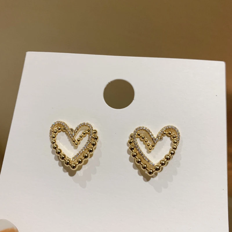 Korean Earrings Two Tone Heart Bling Zircon Stone Stud Earrings for Women Double Layer Exquisite Fashion Jewelry 2022 Trend
Korean Earrings Two Tone Heart Bling Zircon Stone Stud Earrings for Women Double Layer Exquisite Fashion Jewelry 2022 Trend