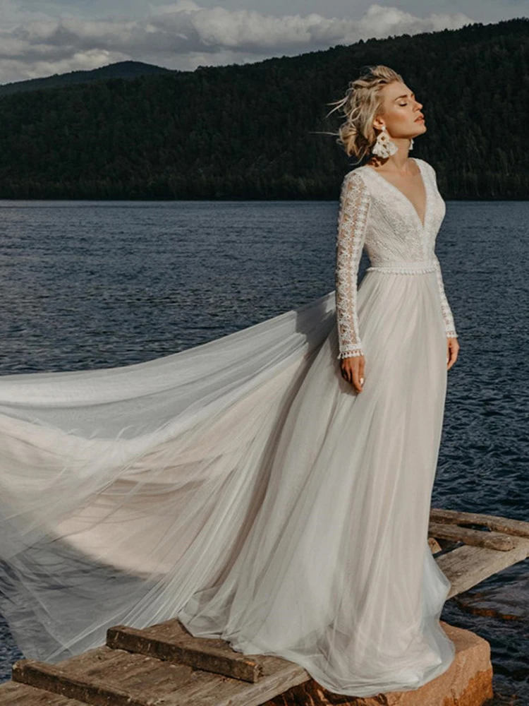 Wedding DressesNew boho V-neck lace appliqué halter wedding dress, tulle full-sleeve A-line fringed court tail, long beach dress
Wedding DressesNew boho V-neck lace appliqué halter wedding dress, tulle full-sleeve A-line fringed court tail, long beach dress