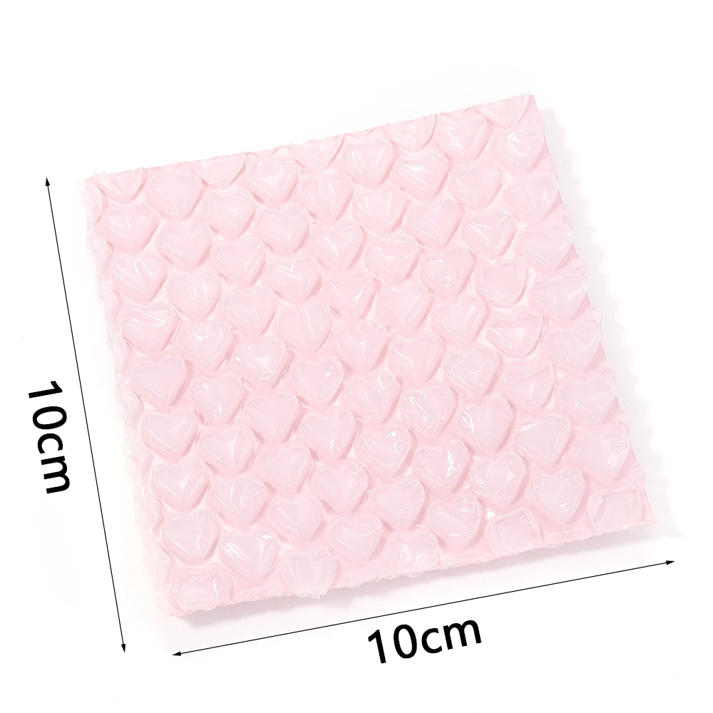 Розовые пузырчатые пакеты-конверты в форме сердца
Розовые пузырчатые пакеты-конверты в форме сердца