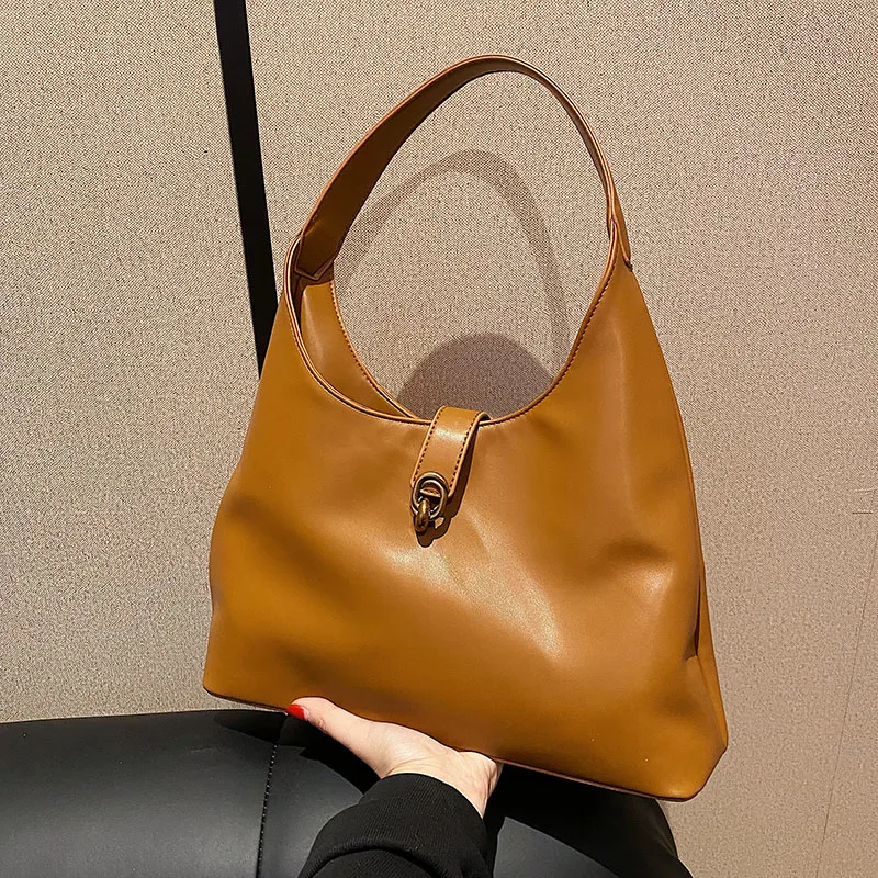 Ladies casual one shoulder bag pure color ladies bag fashionable simple shoulder bag luxury underarm bag leather ladies bag
Ladies casual one shoulder bag pure color ladies bag fashionable simple shoulder bag luxury underarm bag leather ladies bag
