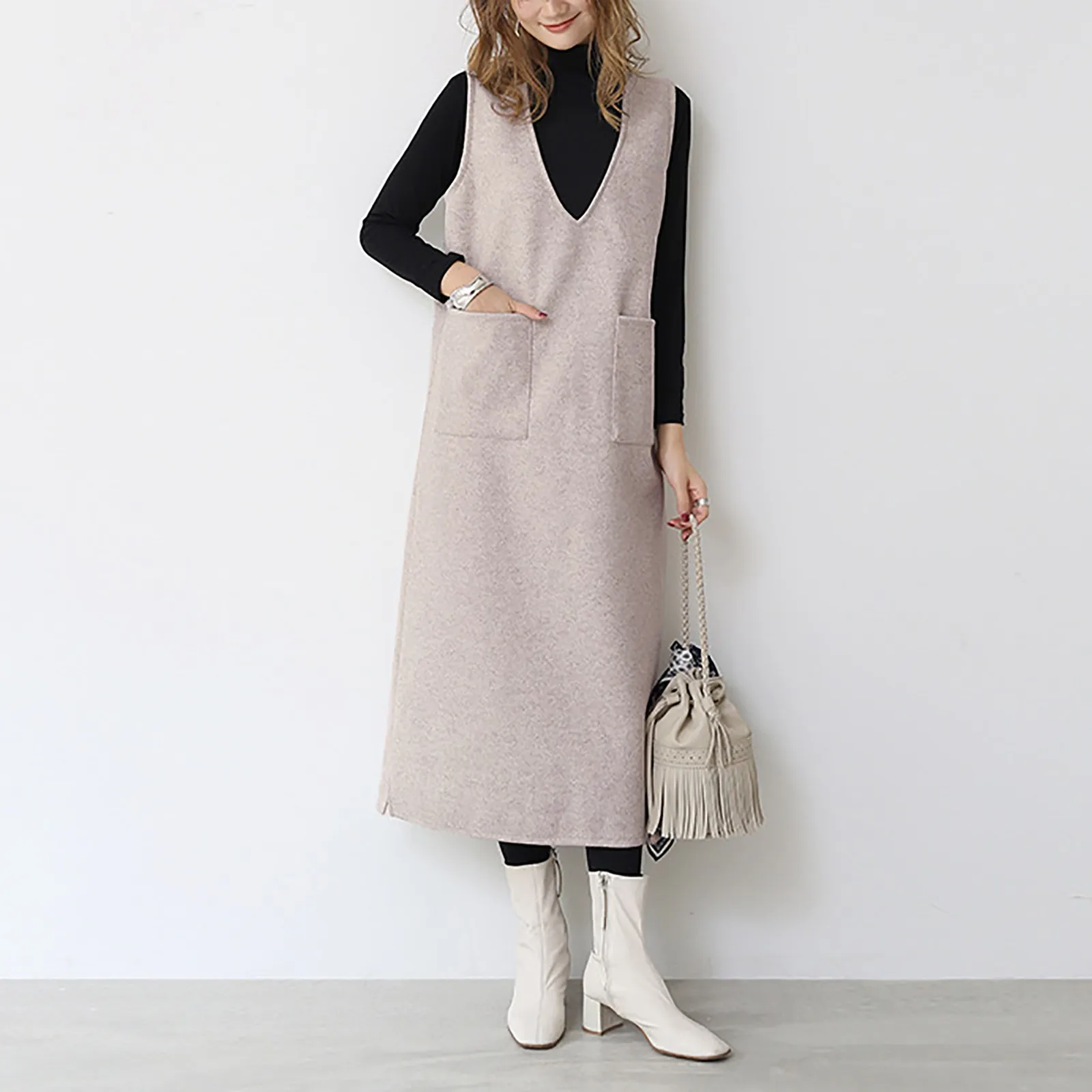 Women's V Neck Sleeveless Knit Dress Autumn And Winter Solid Colour Loose Casual Knitted Long Sweater Dress With Pockets 
Women's V Neck Sleeveless Knit Dress Autumn And Winter Solid Colour Loose Casual Knitted Long Sweater Dress With Pockets