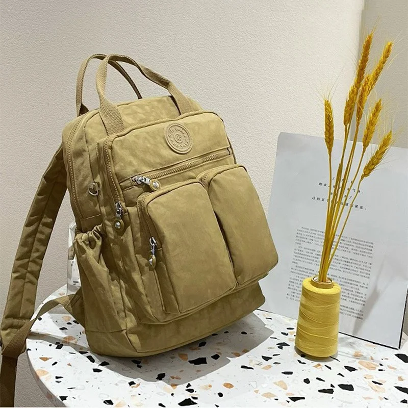 Women's Casual Backpack Lightweight Nylon Multi-pocket Waterproof Travel Bag Mini Backpacks for 14 Inch Computer Bag School Bags 
Women's Casual Backpack Lightweight Nylon Multi-pocket Waterproof Travel Bag Mini Backpacks for 14 Inch Computer Bag School Bags
