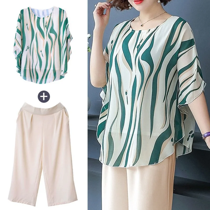 New Summer Women's Clothes Suit Casual Loose Two Pieces Set Chiffon Print T-shirts + Elastic Waist Pants Tracksuit Women J407
New Summer Women's Clothes Suit Casual Loose Two Pieces Set Chiffon Print T-shirts + Elastic Waist Pants Tracksuit Women J407