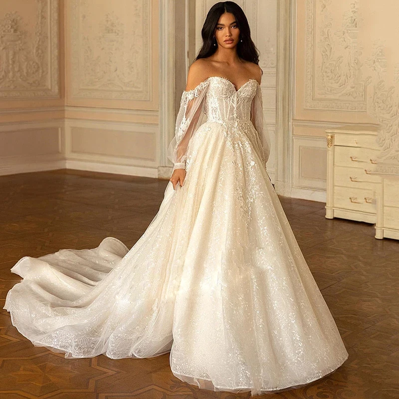 Luxury Champagne Wedding Dress Sexy Off Shoulder Shiny Long Sleeve Bridal Gown Lace Appliques 2023 Robe De Mariée Robe Party
Luxury Champagne Wedding Dress Sexy Off Shoulder Shiny Long Sleeve Bridal Gown Lace Appliques 2023 Robe De Mariée Robe Party