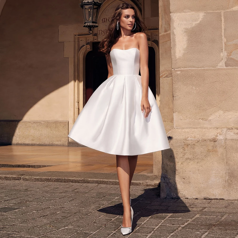 Satin Wedding Dress 2022 White Sweetheart Sleeveless Short Wedding Gown A Line Backless Pockets Knee Length Simple Bridal Dress
Satin Wedding Dress 2022 White Sweetheart Sleeveless Short Wedding Gown A Line Backless Pockets Knee Length Simple Bridal Dress