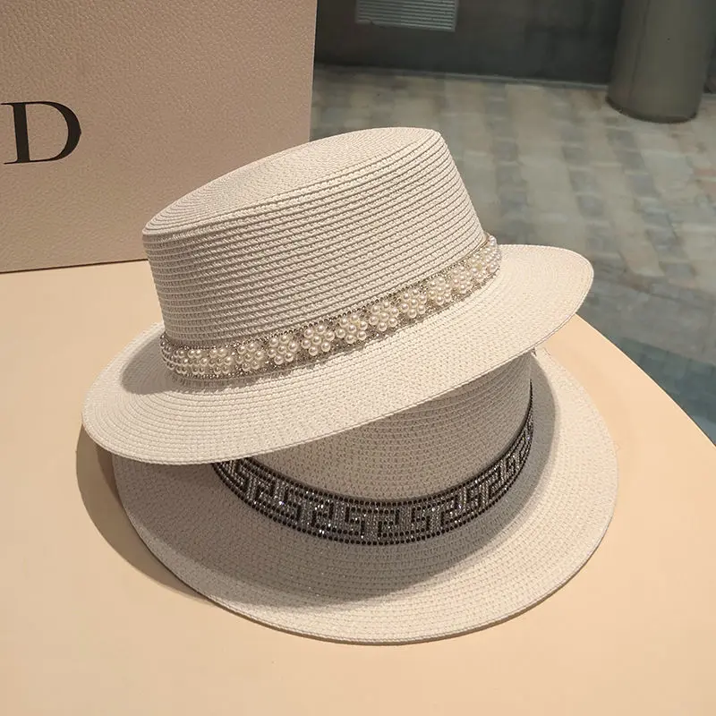2022 Pearl Flat Top Straw Hat Women's Summer Seaside Vacation Beach Sun Hat Sunscreen British Top Cap Fashion All-match Outing 
2022 Pearl Flat Top Straw Hat Women's Summer Seaside Vacation Beach Sun Hat Sunscreen British Top Cap Fashion All-match Outing