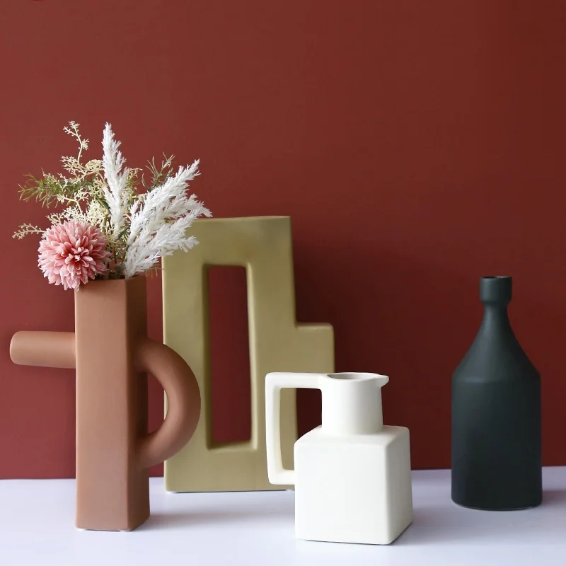 Nordic style Morandi creative simple geometric ceramic dry flower vase living room flower arrangement home decoration
Nordic style Morandi creative simple geometric ceramic dry flower vase living room flower arrangement home decoration