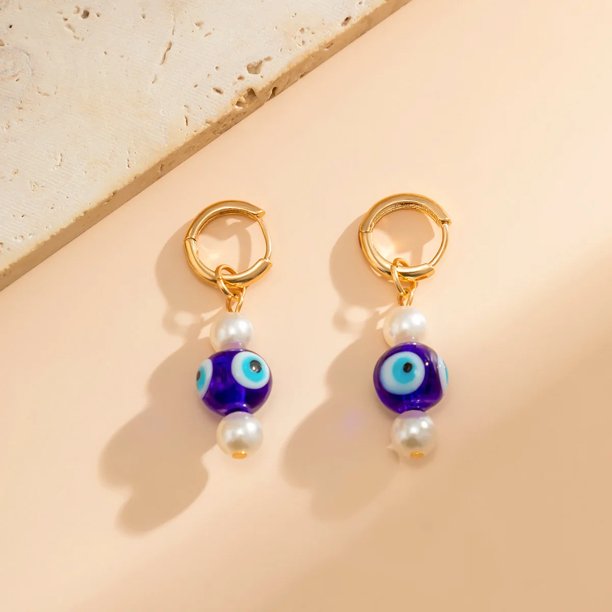 Vintage Fashion New Beaded Ethnic Style Earrings Slightly Inlaid with Imitation Pearl Devil's Eye Earrings for Women
Vintage Fashion New Beaded Ethnic Style Earrings Slightly Inlaid with Imitation Pearl Devil's Eye Earrings for Women