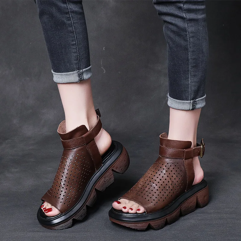 Hollow sandals women's summer leather buckle round toe high heels thick bottom thick heels retro cowhide hole shoes large size
Hollow sandals women's summer leather buckle round toe high heels thick bottom thick heels retro cowhide hole shoes large size