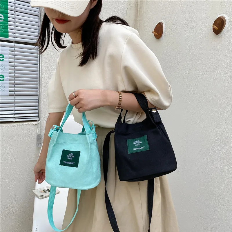 Fashion Mini Canvas Handbags Casual and Artistic Women's Shoulder Bag Simple Solid Color Buckle Handbag Small Bucket Cloth Bag
Fashion Mini Canvas Handbags Casual and Artistic Women's Shoulder Bag Simple Solid Color Buckle Handbag Small Bucket Cloth Bag