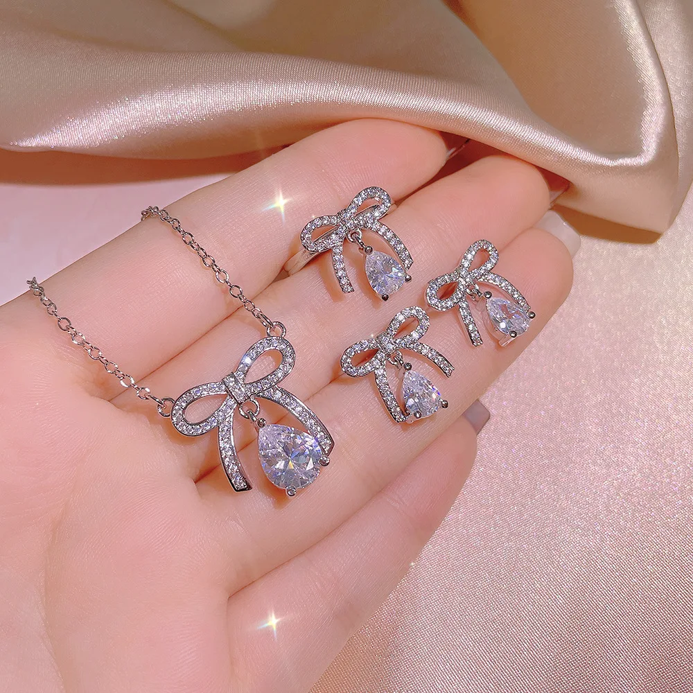 Elegant Fashion 925 Sterling Silver Bowknot Water Drop Zircon Pendants Necklace Earrings Ring Sets for Women Bridal Wedding
Elegant Fashion 925 Sterling Silver Bowknot Water Drop Zircon Pendants Necklace Earrings Ring Sets for Women Bridal Wedding