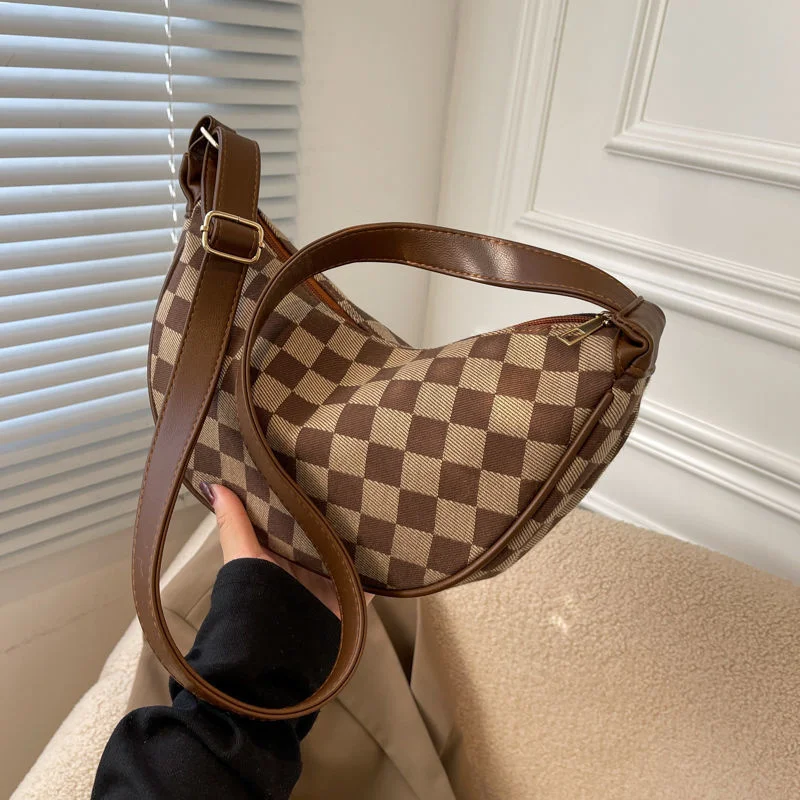 Korean version messenger bag female student cloth bag chessboard lattice bag advanced feeling Shoulder Bag Fashion dumpling bag
Korean version messenger bag female student cloth bag chessboard lattice bag advanced feeling Shoulder Bag Fashion dumpling bag