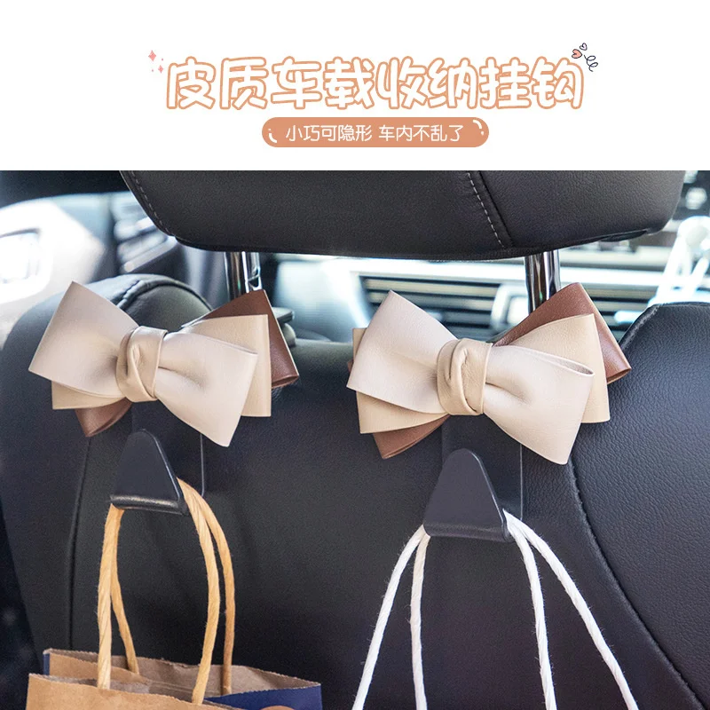 Creative new car hook seat back cartoon advanced aesthetic bow hook multi-functional storage storage car supplies
Creative new car hook seat back cartoon advanced aesthetic bow hook multi-functional storage storage car supplies