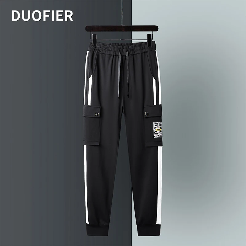 Men Elastic Waist Multi Pockets Spring Autumn Fashion Cargo Pants Patchwork Sweatpants Casual Male Cotton Sport Fitness Trousers
Men Elastic Waist Multi Pockets Spring Autumn Fashion Cargo Pants Patchwork Sweatpants Casual Male Cotton Sport Fitness Trousers