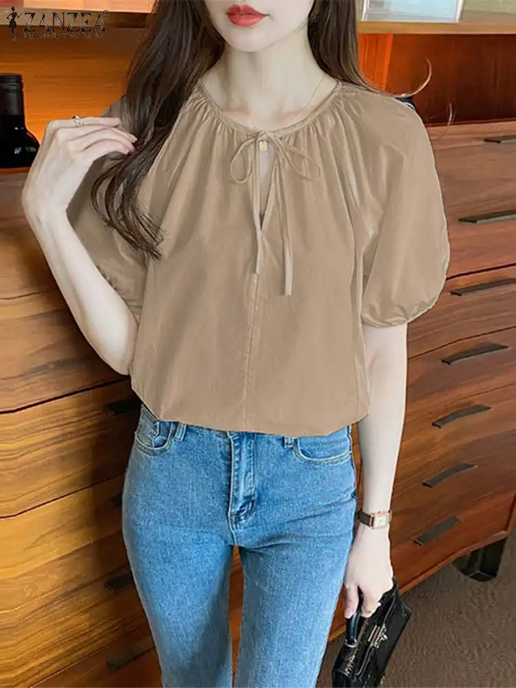 2023 ZANZEA Woman Korean Fashion Shirt Summer Puff Sleeve O Neck Chemise Female Casual Holiday Blouse Vintage Lace Up Tunic Tops
2023 ZANZEA Woman Korean Fashion Shirt Summer Puff Sleeve O Neck Chemise Female Casual Holiday Blouse Vintage Lace Up Tunic Tops