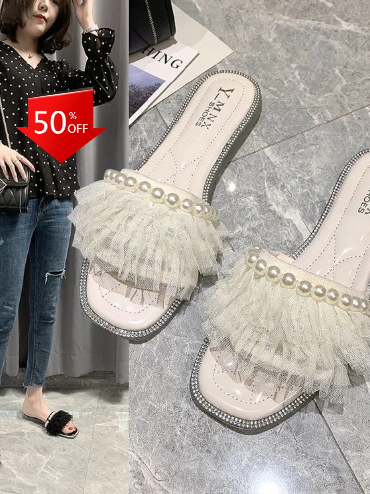 Женские шлепанцы на плоской подошве, корейский стиль, кружевные, с бусинами, летняя обувь
Женские шлепанцы на плоской подошве, корейский стиль, кружевные, с бусинами, летняя обувь