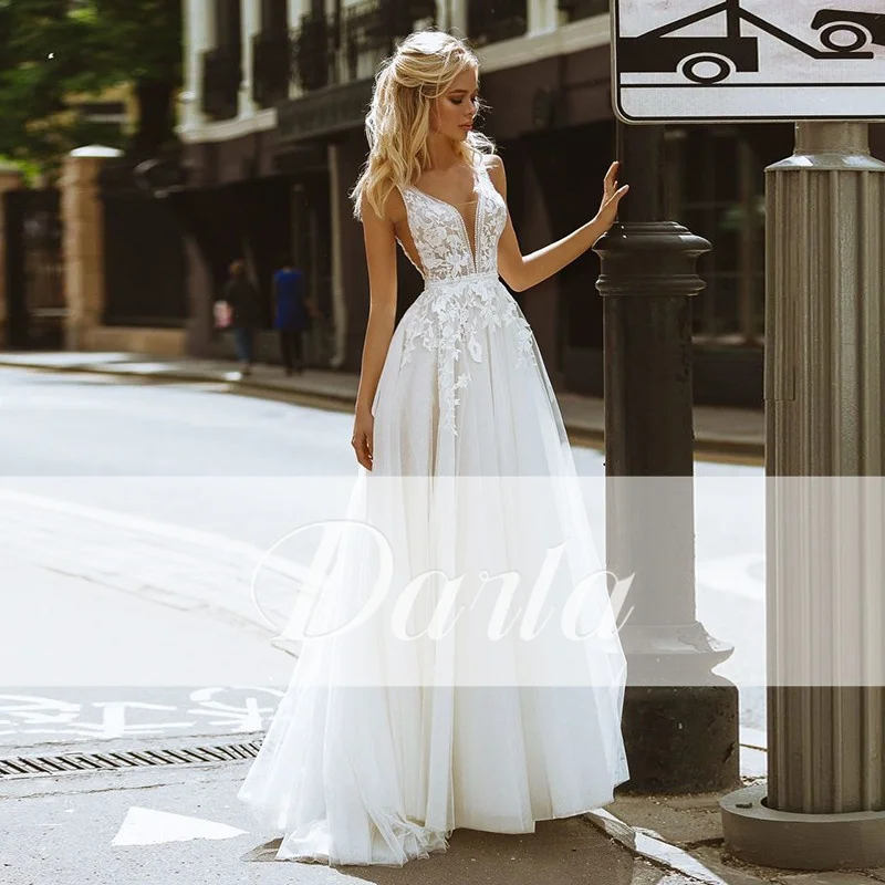 Elegant Boho V-Neck Appliques Lace A-Line Wedding Dresses Tulle Beading Sleezeless zipper Bridal Dress bestidos de novia 2023
Elegant Boho V-Neck Appliques Lace A-Line Wedding Dresses Tulle Beading Sleezeless zipper Bridal Dress bestidos de novia 2023