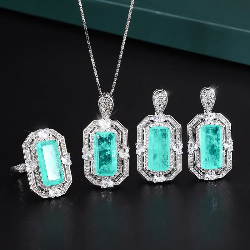 Charm Fashion Square Paraiba High Carbon Diamond Adjustable Ring Necklace Earrings Pack Lot Fine Jewelry for Woman Creative Gift
Charm Fashion Square Paraiba High Carbon Diamond Adjustable Ring Necklace Earrings Pack Lot Fine Jewelry for Woman Creative Gift