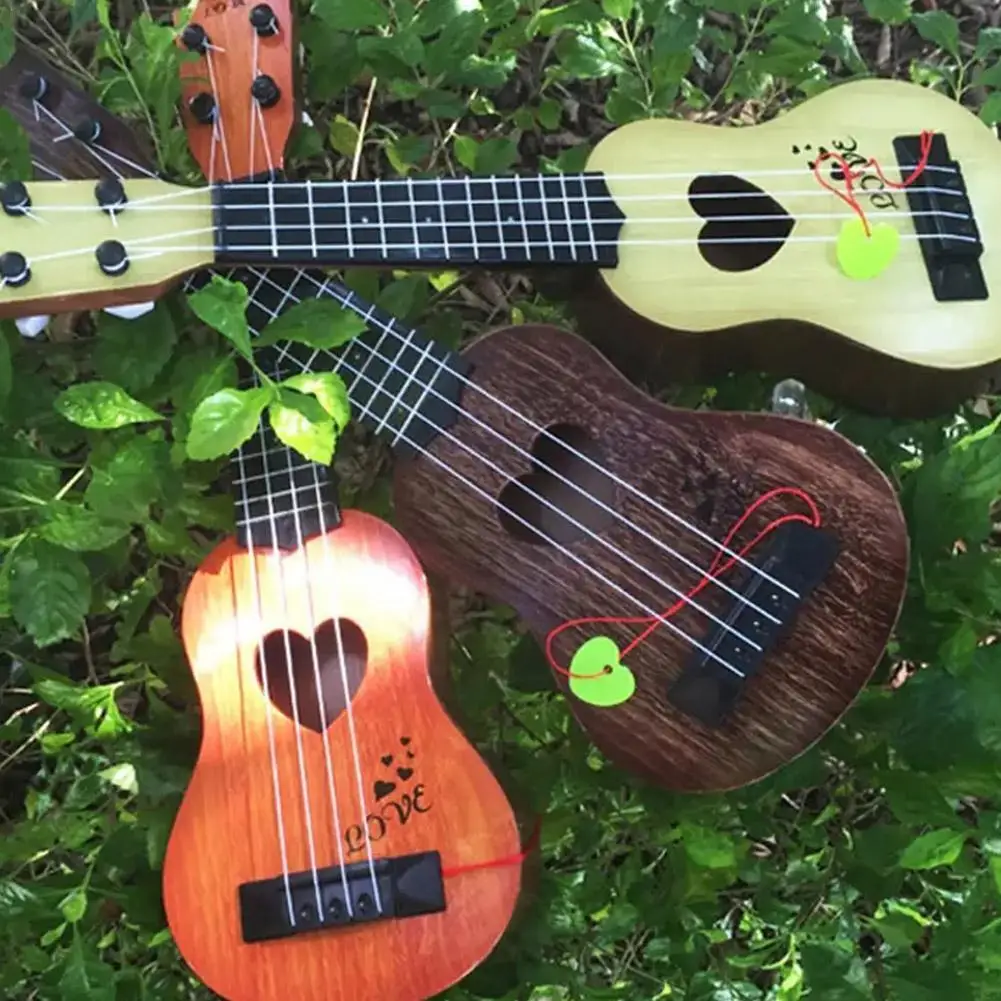 4 String Mini Guitarra Musical Gifts Musical Instruments Early Education Toys For Beginners Kids Children Toys O3M2
4 String Mini Guitarra Musical Gifts Musical Instruments Early Education Toys For Beginners Kids Children Toys O3M2