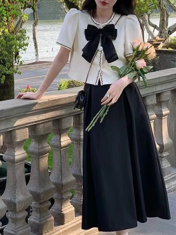 Women Puff Sleeve Loose Sweet Midi Skirt Set Summer Bow Elegant Two Piece Set Female Korean Fashion Temperament Kawaii Suit 2022
Women Puff Sleeve Loose Sweet Midi Skirt Set Summer Bow Elegant Two Piece Set Female Korean Fashion Temperament Kawaii Suit 2022