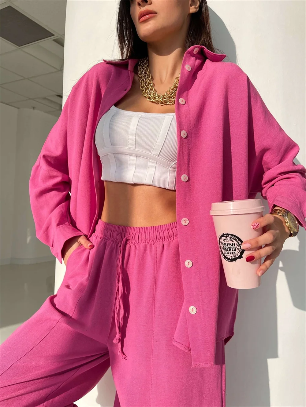 Two piece set consisting of long sleeved T-shirt and trousers, European and American solid color leisure suit with lapel, harem
Two piece set consisting of long sleeved T-shirt and trousers, European and American solid color leisure suit with lapel, harem