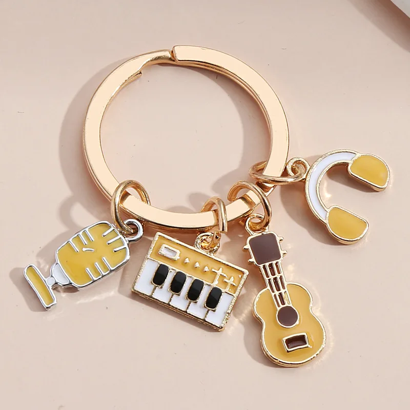 Violin Music Keyboard Headphones KeyChain Piano KeyRing Unique Women Man Charm Pendant Accessories Jewelry Gift 
Violin Music Keyboard Headphones KeyChain Piano KeyRing Unique Women Man Charm Pendant Accessories Jewelry Gift
