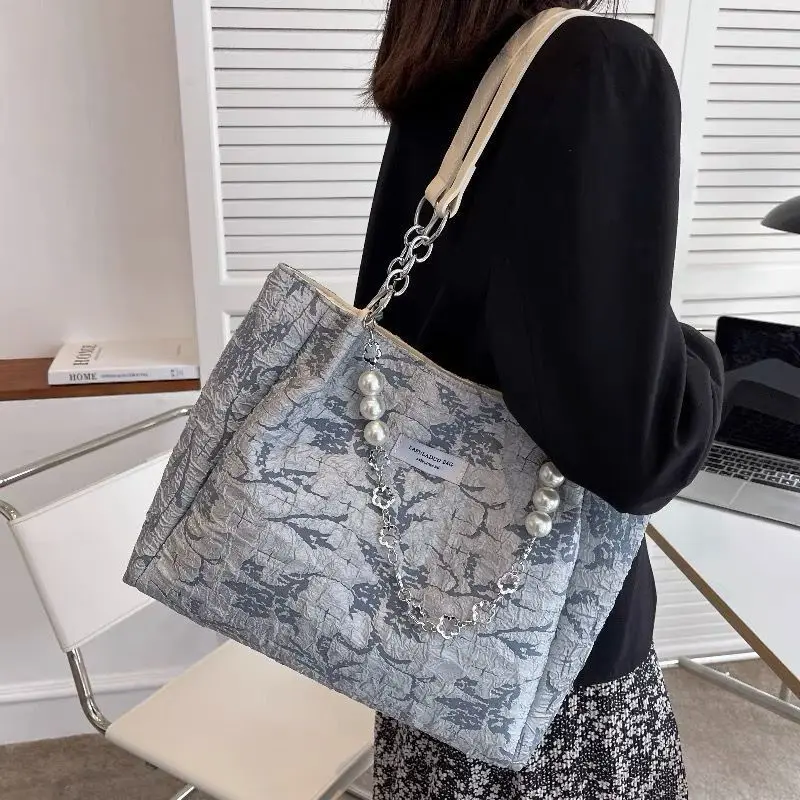 High-Quality Canvas Large Bag Women's New Trendy All-Match Large-Capacity Western-Style Fashion Niche Shoulder Tote Bag
High-Quality Canvas Large Bag Women's New Trendy All-Match Large-Capacity Western-Style Fashion Niche Shoulder Tote Bag