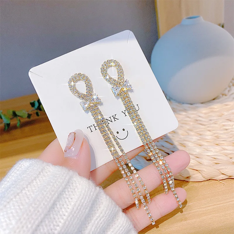 925 Silver Needle Long Fashion Full Drill Tassel Bow Earrings for Women Personality Wedding Earring Fashion Jewelry Gifts
925 Silver Needle Long Fashion Full Drill Tassel Bow Earrings for Women Personality Wedding Earring Fashion Jewelry Gifts