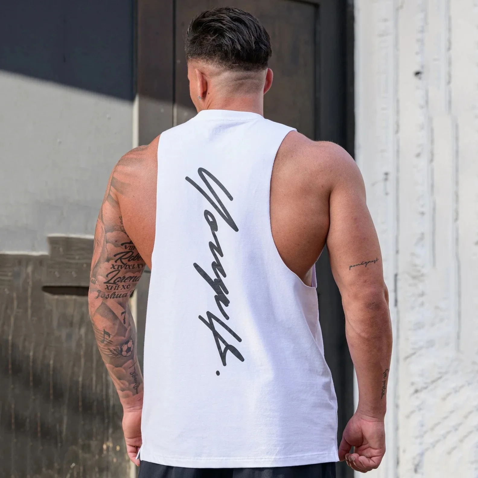 Gym Bodybuilding Men's Tank Top New Summer Sports Leisure Running Exercise Basketball Cotton Elastic Sleeveless Tank Top
Gym Bodybuilding Men's Tank Top New Summer Sports Leisure Running Exercise Basketball Cotton Elastic Sleeveless Tank Top