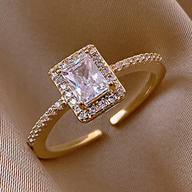 Luxury Sparkling Zircon Square Ring For Women Diamond Open Ring Adjustable Cubic Metal Finger Ring Elegant Wedding Party Jewelry
Luxury Sparkling Zircon Square Ring For Women Diamond Open Ring Adjustable Cubic Metal Finger Ring Elegant Wedding Party Jewelry