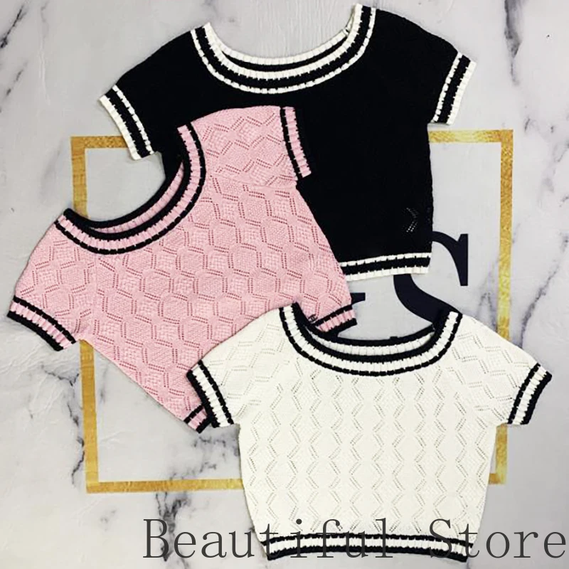 High end fashion woman clothes Short sleeve sweater letter logo brand Round neck Hollowed out knitting pullover womens sweaters
High end fashion woman clothes Short sleeve sweater letter logo brand Round neck Hollowed out knitting pullover womens sweaters