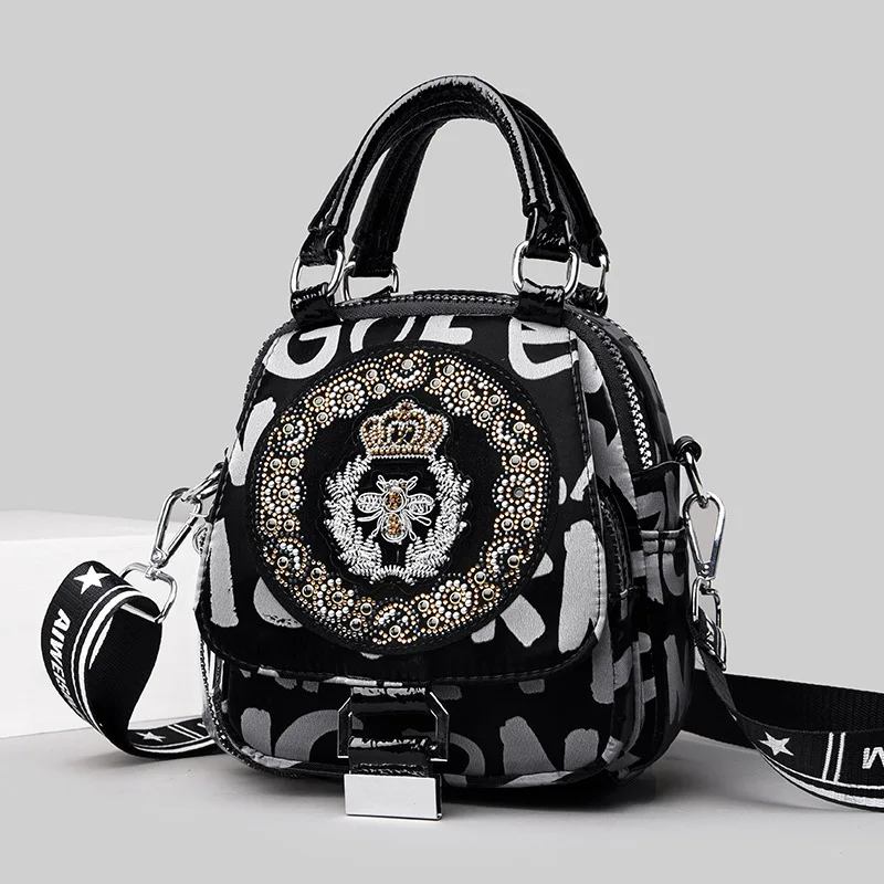 High Quality Hot Diamond Backpack Women's 2022 New Female Three Use Shoulder Crossbody Super Bright Leather Embroidery Small Tot
High Quality Hot Diamond Backpack Women's 2022 New Female Three Use Shoulder Crossbody Super Bright Leather Embroidery Small Tot
