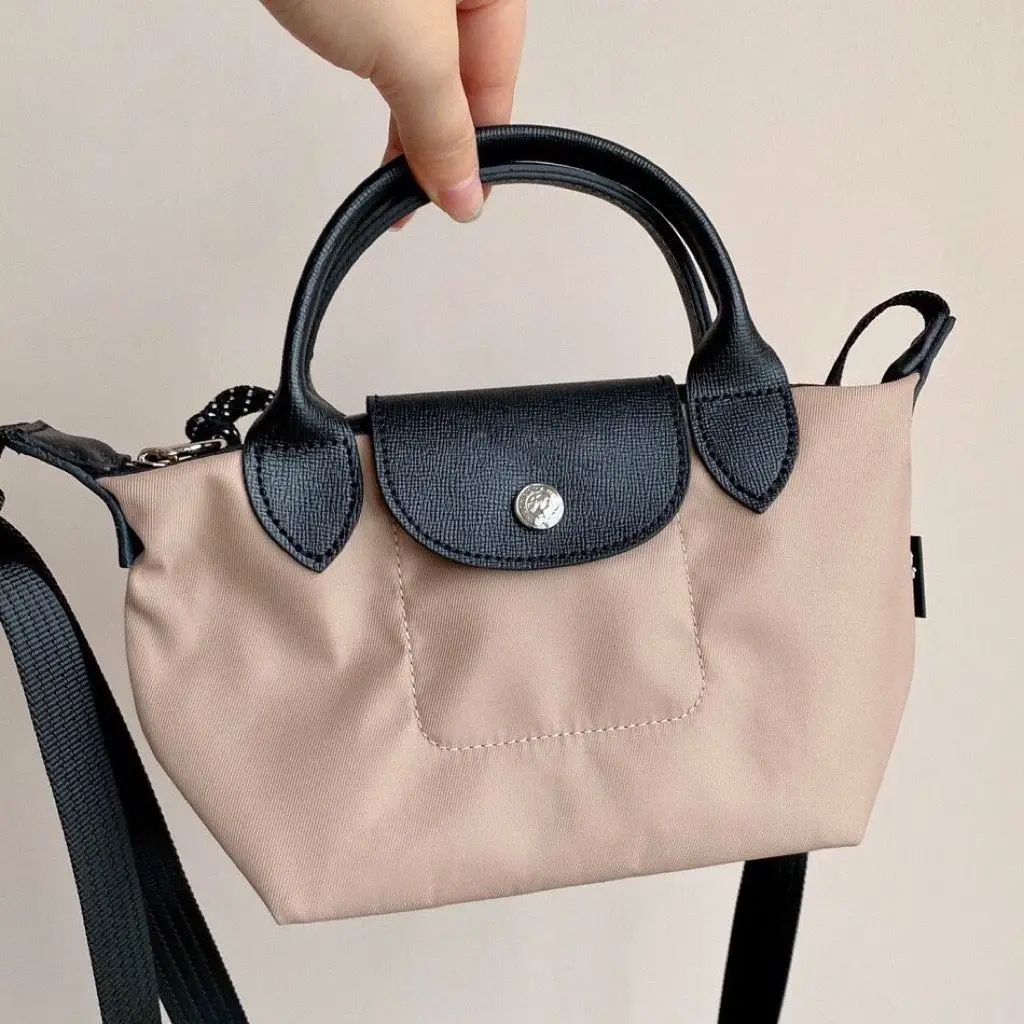 Women's Bag 2023 New Bag niche series versatile crescent cross body bag popular single shoulder underarm dumplings
Women's Bag 2023 New Bag niche series versatile crescent cross body bag popular single shoulder underarm dumplings