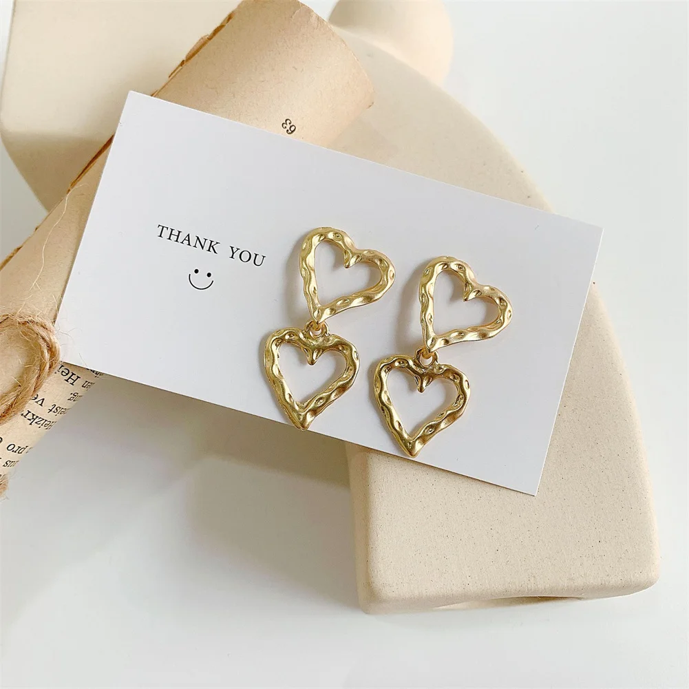 Temperament Gold Color Fashion Hollow Out Heart Shape Stud Earrings For Women Student Girlfriend Jewelry Vintage Metal Earrings
Temperament Gold Color Fashion Hollow Out Heart Shape Stud Earrings For Women Student Girlfriend Jewelry Vintage Metal Earrings