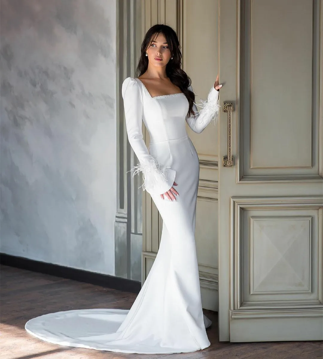 Elegant Long Crepe Beaded Wedding Dresses With Feathers فساتين السهرة Mermaid Sweep Train Bridal Gowns Robe de soirée for Women
Elegant Long Crepe Beaded Wedding Dresses With Feathers فساتين السهرة Mermaid Sweep Train Bridal Gowns Robe de soirée for Women