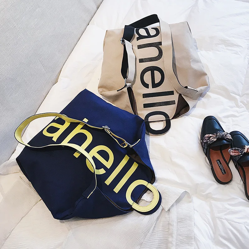 Модная вместительная сумка, трендовые дизайнерские сумки через плечо с надписью для женщин, повседневная женская большая сумка для покупок 
Модная вместительная сумка, трендовые дизайнерские сумки через плечо с надписью для женщин, повседневная женская большая сумка для покупок