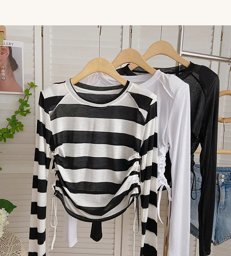 Summer New Korean casual black white striped thin long sleeved T-shirt for women
Summer New Korean casual black white striped thin long sleeved T-shirt for women