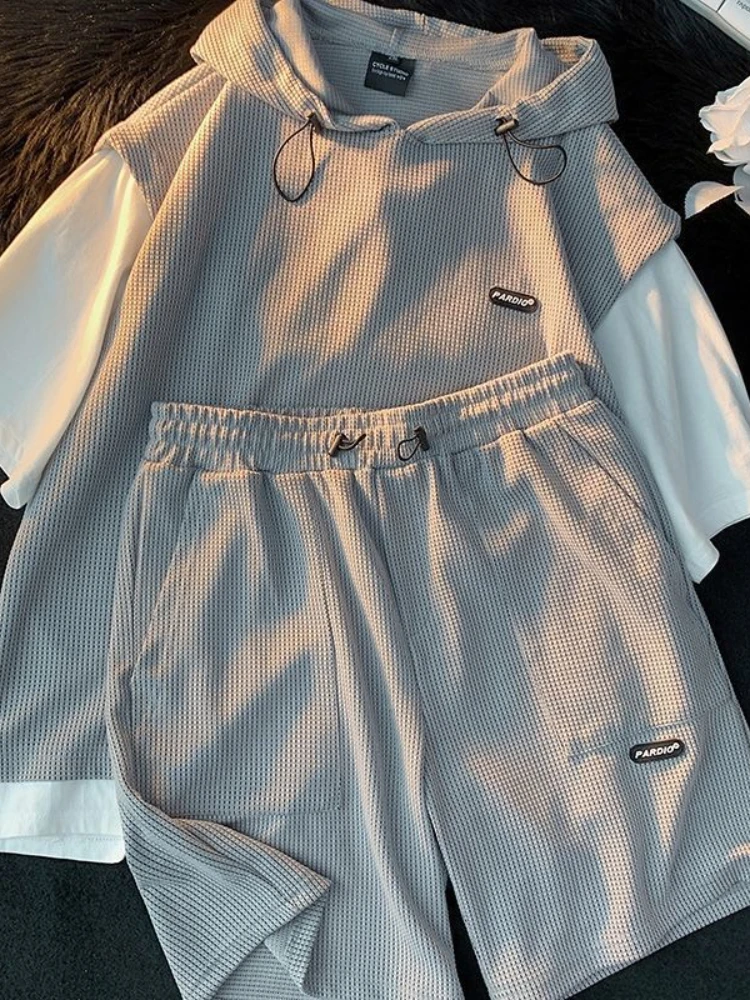 Summer Fashion Sports Suit Men Women Short-sleeved Shorts Loose Two-piece Suit Fake Two-piece Casual Hooded T-shirt+sports Short
Summer Fashion Sports Suit Men Women Short-sleeved Shorts Loose Two-piece Suit Fake Two-piece Casual Hooded T-shirt+sports Short