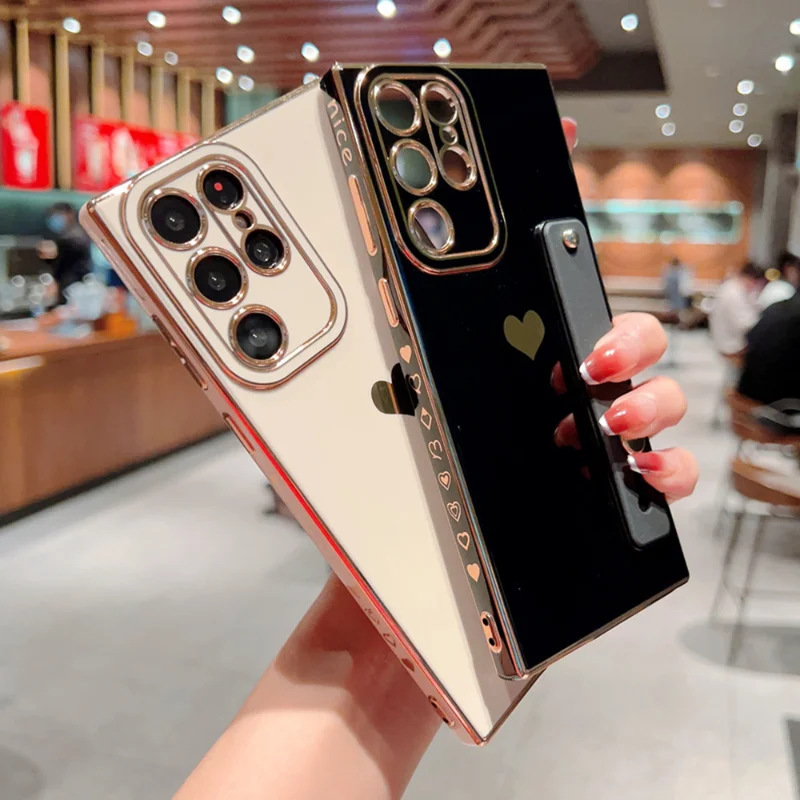 Electroplated love wrist strap phone case is applicable to Samsung Galaxy S23 Ultra S22 Plus S21 S20FE A53 A52 shockproof
Electroplated love wrist strap phone case is applicable to Samsung Galaxy S23 Ultra S22 Plus S21 S20FE A53 A52 shockproof