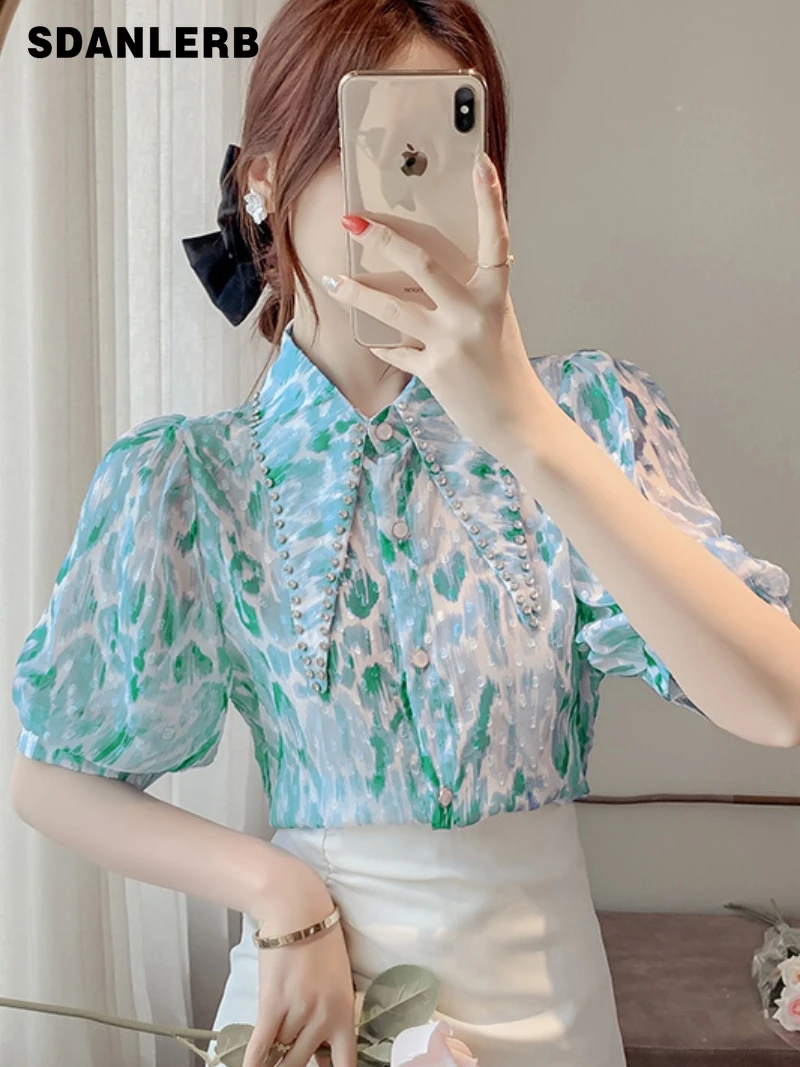 Diamond Pointed Collar Floral Shirt Women's Summer 2022 New Camisas Mujer Design Sense Niche Chic Unique Puff Sleeve Top
Diamond Pointed Collar Floral Shirt Women's Summer 2022 New Camisas Mujer Design Sense Niche Chic Unique Puff Sleeve Top
